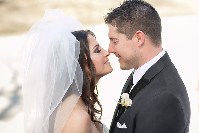 Real Wedding: Jillian and Greg Kissing