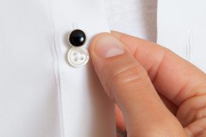 How to wear cufflinks and studs - insert stud through the back buttonhole