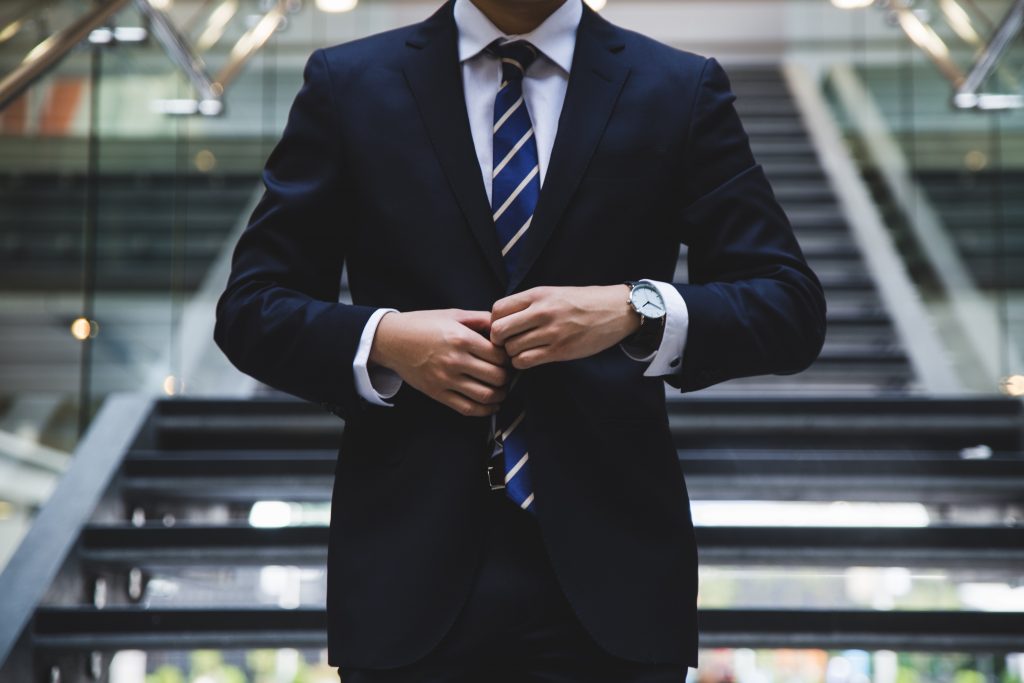 Buying your first suit - Man in a navy suit - Jim's Formal Wear