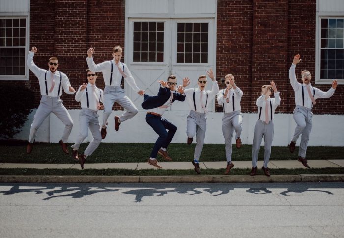 Groomsmen jumping with groom - How to pick your groomsmen