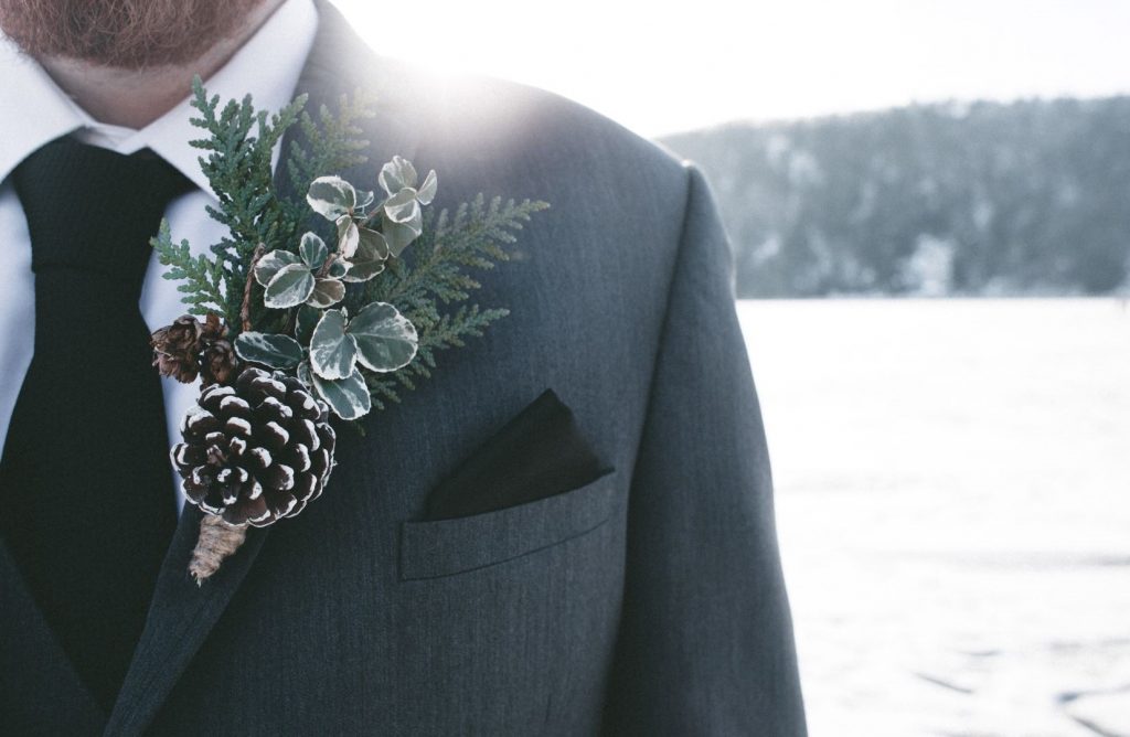 How to wear a Boutonniere - Man with a winter themed Boutonniere