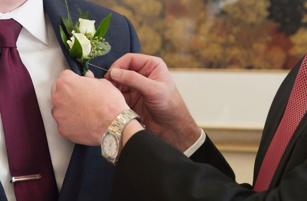 how to wear a Boutonniere