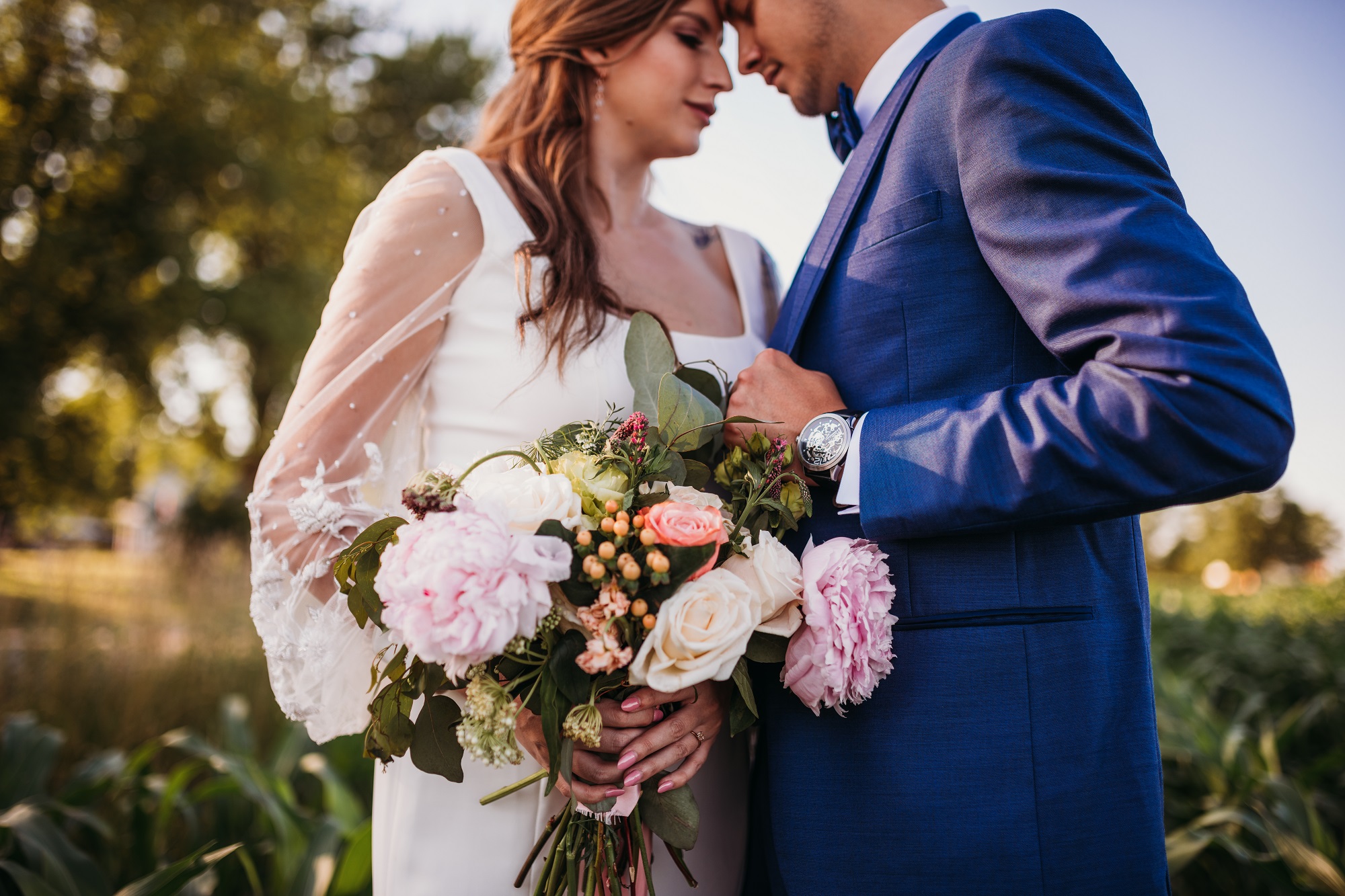 minimony or microwedding - bride and groom embracing