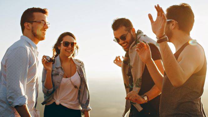 Three guys and a girl hanging out