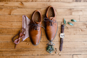 eco-friendly wedding, men's accessories on wood floor