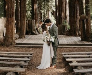 eco-friendly wedding, bride groom kissing in forest