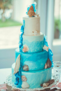 beach wedding cake with seashells