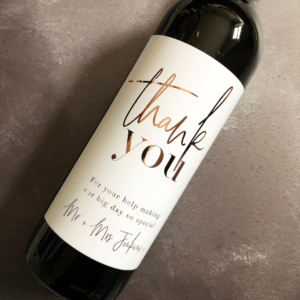 wine bottle with label that says thank you