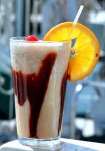 alcholic drink called bushwacker that contains chocolate milkshake, rum, kahlua,crème de cacao, and cream of coconut 