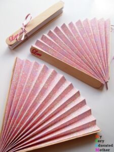 DIY wedding pink paper fans 