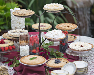 variety of pies on a table at a wedding