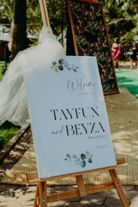 Display a sign with the wedding hashtag at the entrance to the wedding